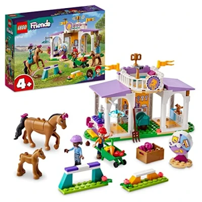 Abbildung von LEGO 41746 Friends Reitschule Set mit 2 Spielzeug Pferden, Aliya und Mia Mini Puppen, Reitstall Pferdespielzeug, Tierpflege Geschenk für Kinder, Mädchen Jungen ab 4 Jahre