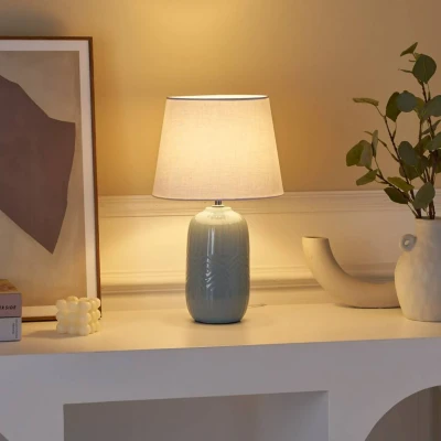 Abbildung von Pauleen 48321 Tischleuchte Glowing Hug E14 max. 20W Weiß, Graublau Stoff, Keramik Nachttischleuchte