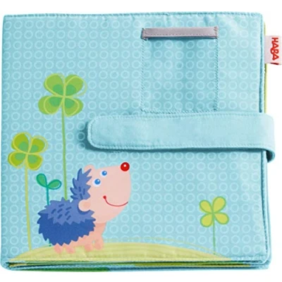 Abbildung von HABA 305258 Baby Fotoalbum Glück, Album aus Stoff mit 10 Seiten, Einstecktaschen für 8 Fotos im Format x 15 cm, ab 12 Monaten