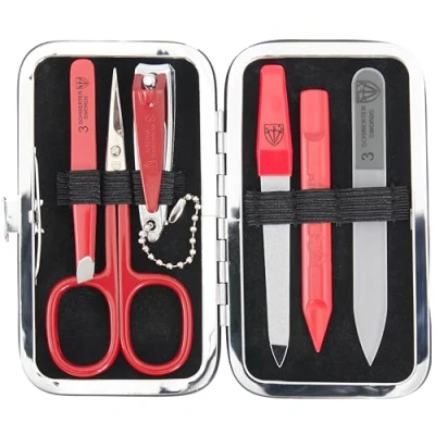 Abbildung von DREI SCHWERTER Germany 6 tlg. Maniküre Set &#039;Catania&#039; Nagelset mit Hautschere, Nagelknipser, Pinzette, Saphirnagelfeile, Glasnagelfeile, Nagelreiniger im Rahmenetui rot/rote Instrumente