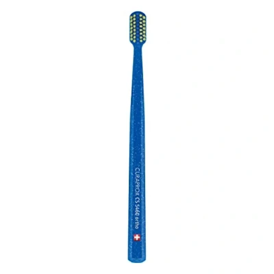 Abbildung von Curaprox Zahnbürste CS 5460 Ortho Handzahnbürste mit Spezialschnitt für Zahnspangen Ultra Soft CUREN Borsten Blau Grün
