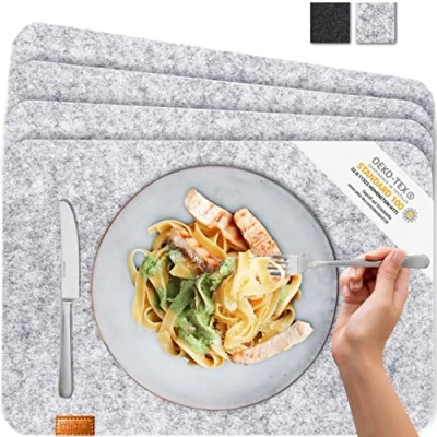 Abbildung von Miqio® Design Tischset aus Filz Marken Label echtem Leder 4er Set Platzset (grau meliert) abwaschbar Filzmatte Tisch Untersetzer Platzdeckchen abwischbar
