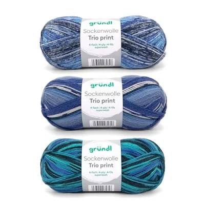 Abbildung von Gründl Sockenwolle Trio Strickset aus 3 x 100 g Sockengarn (75% Schurwolle (superwash), 25% Polyamid) + Anleitung, blau grün