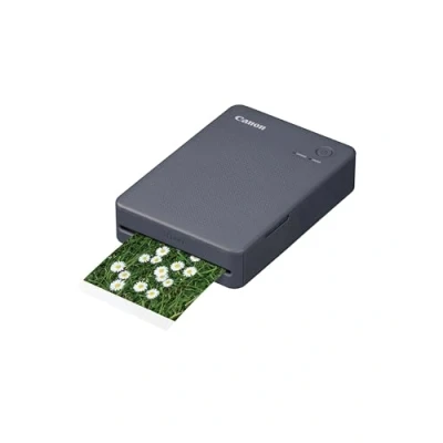 Abbildung von Canon SELPHY QX20 mobiler Fotodrucker per WLAN direkt vom Smartphone drucken. Thermosublimationsdruck, 2 Größen Stickerpapier und Laden USB C Dunkelgrau
