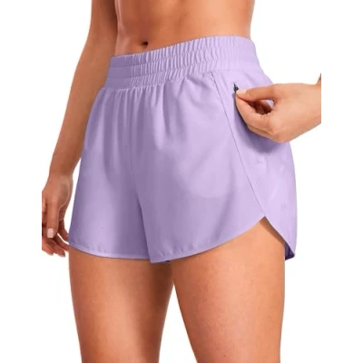 Abbildung von CRZ YOGA Damen Kurz Sporthose Laufhose High Waist Fitness Sport Shorts Kurze Hose mit Reißverschlusstasche Flieder 36