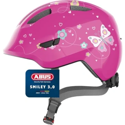 Abbildung von ABUS Kinderhelm Smiley 3.0 Fahrradhelm mit tiefer Passform, kindergerechten Designs &amp; Platz für einen Zopf Mädchen und Jungs Pink Schmetterlings Muster, Größe M