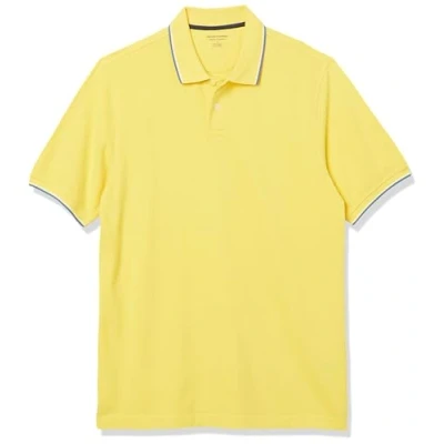 Abbildung von Amazon Essentials Herren Polohemd aus Baumwollpiqué in normaler Passform (erhältlich Übergrößen), Gelb Twin Stripe, XL