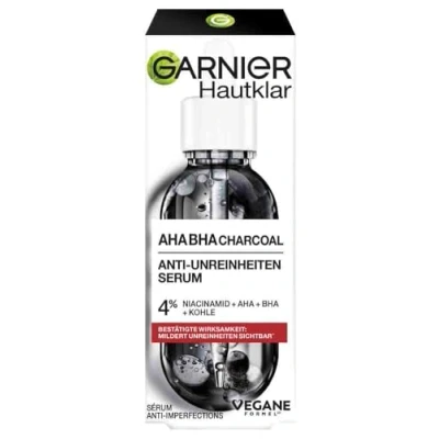 Abbildung von Garnier AHA + BHA Serum, Salicylsäure, Kohle &amp; 4% Niacinamide Gesichtspflege gegen Unreinheiten, mildert Mitesser sichtbar, für ebenmäßige geschmeidige Haut, Hautklar, 30ml