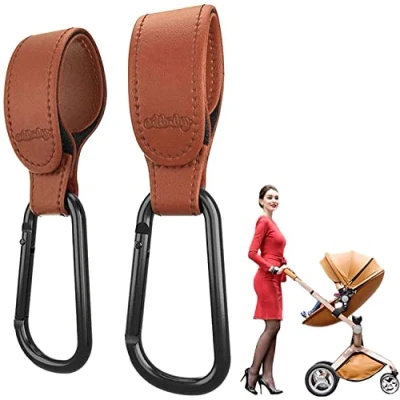 Abbildung von Edibaby, Kinderwagen Haken, Zubehör, aus Leder, 2 Stück, Universell Einsetzbar, Karabinerhaken für zum Aufhängen von Taschen, Rucksäcken, Geldbörsen usw. (Braun)