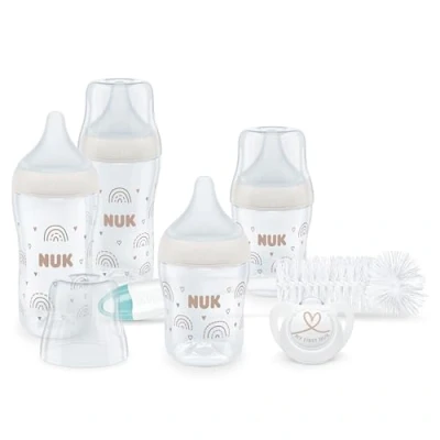 Abbildung von NUK Perfect Match Start Babyflaschenset Ab 0 Monate Passt sich dem Baby an 4 Anti Colic Babyflaschen, Schnuller, Flaschenbürste und mehr BPA frei 7 Stück