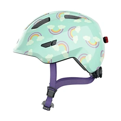 Abbildung von ABUS Kinderhelm Smiley 3.0 LED Fahrradhelm mit Licht tiefe Passform &amp; Platz für einen Zopf Mädchen und Jungs Hellblau Regenbogen Muster, Größe M