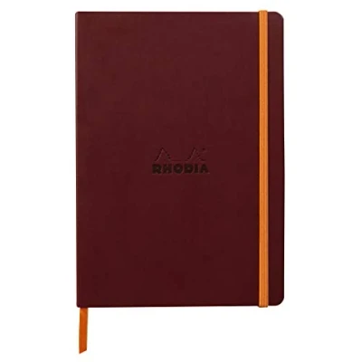 Abbildung von Rhodia 117436C Notizheft Softcover Rhodiarama DIN A5 (14,8x21 cm), 80 Blatt, liniert Clairefontaine Papier Elfenbein 90g Lesezeichen, Gummizugverschluss, Cover aus Kunstleder Weinrot, 1 Stück