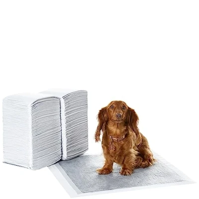 Abbildung von Amazon Basics Trainingspads für Hunde und Welpen mit Kohlenstoff zur Geruchskontrolle, auslaufsicheres Design schnell trocknender Oberfläche, Normal (120 Stück), Grau