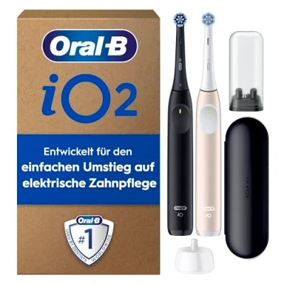 Abbildung von Oral B iO Series 2 Elektrische Zahnbürste, Electric Toothbrush, DUO Pack, 2. Handstück, 3 Putzmodi für Zahnpflege, Reise Etui, Aufsteckbürsten Designed by Braun, Night Black, Calm Pink