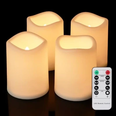 Abbildung von FREEPOWER 4er LED Kerzen Outdoor mit Fernbedienung und Timer Batteriebetrieben Flammenlose Stumpenkerzen Warmweiß Flackern Kunststoff Ø 7.5 x 10cm