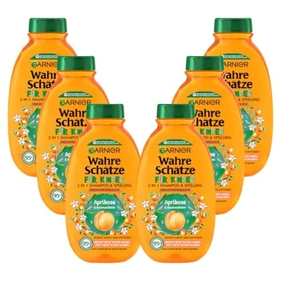 Abbildung von Garnier Shampoo für Kinder, Mildes 2 in1 Pflegeshampoo empfindliches Haar und leichte Kämmbarkeit, Mit Aprikose Baumwollblüte, Wahre Schätze Kids, 6 x 250 ml