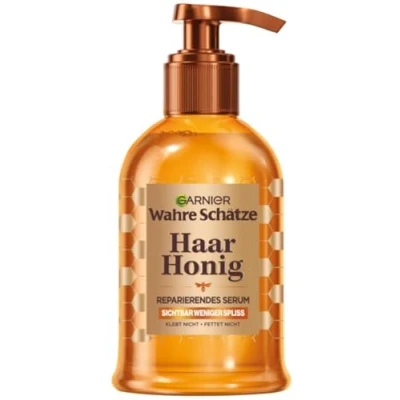 Abbildung von Garnier Wahre Schätze Haarserum für splissiges oder brüchiges Haar, Reparierendes Serum mit Akazienhonig mehr Glanz und Geschmeidigkeit, Hitzeschutz bis zu 230C, Honig Schätze, 1 x 115 ml