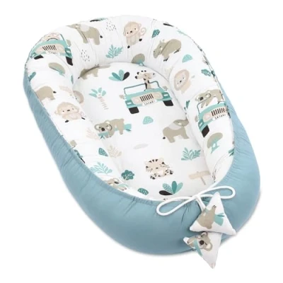 Abbildung von Babynest Kokon Neugeborene 90 x 50 cm Handmade Babynestchen Kuschelnest Baby Nest Cocoon Nestchen aus Baumwolle Afrika Blau