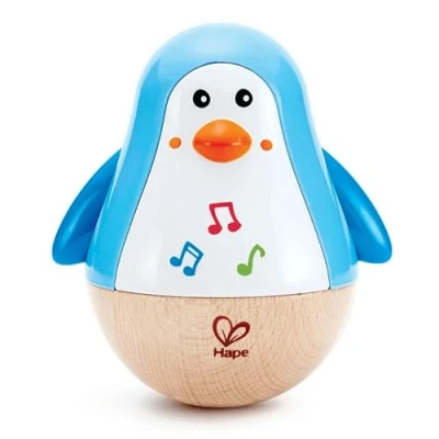 Abbildung von Hape Stehauf Pinguin, Stehaufmännchen aus Holz, blau, Babyspielzeug ab 6 Monate, Motorikspielzeug Holz