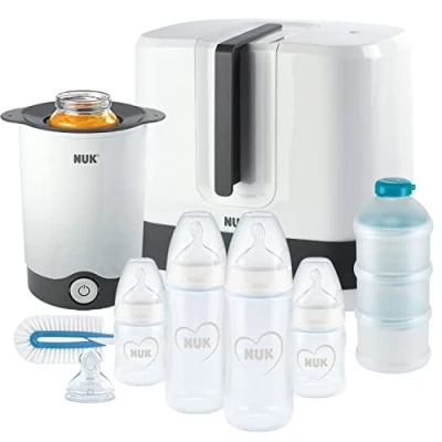 Abbildung von NUK First Choice+ Complete Komplettes Fütterungsset Vario Express sterilisator, 4x babyflaschen, 1x Babyflaschensauger, flaschenwärmer und mehr Herz (neutral) 9 stück