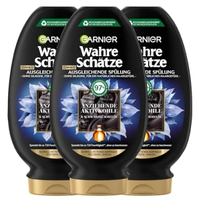 Abbildung von Garnier Ausgleichende Spülung, Gegen schnell fettende Kopfhaut und trockene Haarlängen, Mit reinigender Aktivkohle Schwarzkümmelöl, Wahre Schätze, 3 x 200 ml