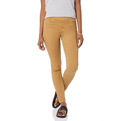 Abbildung von Amazon Essentials Damen Pull On Stretch Jeggings mit mittelhohem Bund (in Übergrößen erhältlich), Helles Kamelbraun, 42
