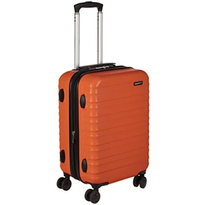 Abbildung von Amazon Basics Handgepäck Koffer, ABS Hartschale, Erweiterbarer Trolley mit 4 Drehbaren Rädern, 55 cm, Orange