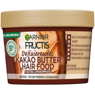 Abbildung von Garnier Fructis definierende Kakao Butter Haarmaske, Leave In Für trockenes und lockiges Haar, gebändigtes, Geschmeidiges Mit Sonnenblumenöl, Jojobaöl, Kokosnussöl, Hairfood, 3in1, 400ml