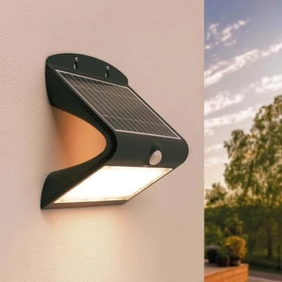 Abbildung von Ledvion Moderne Solar Wandleuchte mit Bewegungssensor, Schwarz, 8W, 3000K, IP65 Wasserdicht &amp; 220 Lumen, Bewegungserkennung Dämmerungsschalter, Energieeffizient Wetterfest