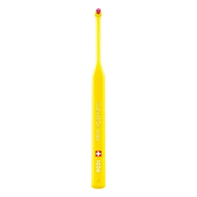 Abbildung von Curaprox Einbüschel Zahnbürste CS 1006 single perfekte Pflege vom Zahnfleischsaum Gelb Magenta