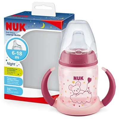 Abbildung von NUK First Choice+ Trinklernflasche Learner Cup Night 618 Monate 150 ml Anti Colic Ventil auslaufsichere Trinkschnabel mit Leuchteffekt Ergonomische Griffe BPA frei Rosa