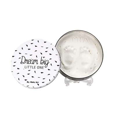 Abbildung von Baby Art Magic Box White and Black Runde aus Metall mit Modelliermasse, Set für Hand und Fußabdruck, Geschenk zur Geburt oder Taufe