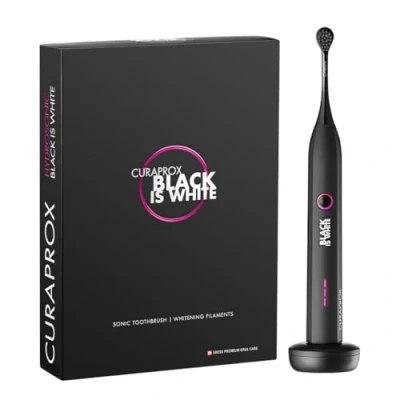 Abbildung von Curaprox Schallzahnbürste Black is white Hydrosonic, 3 verschiedene Putzstufen, LED Funktionsanzeige, Bürstenkopf mit Aktivkohle, Ladegerät und Travel Case
