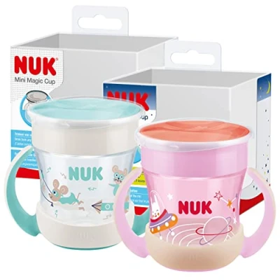 Abbildung von NUK Mini Magic Cup Trinklernbecher mit Leuchteffekt 6+ Monate 160 ml auslaufsicherer 360 Trinkrand ergonomische Griffe BPA frei Lila