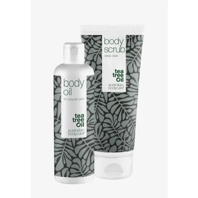 Abbildung von 2 Produkte zur Verbesserung des Aussehens von Cellulite: Body Scrub 200 ml mit 100% natürlichem Teebaumöl und Oil 150 ml, das die Sichtbarkeit Cellulite reduziert Dermatologisch getestet