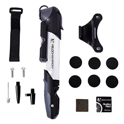 Abbildung von VeloChampion Mini Fahrradluftpumpe für alle Ventile. Kleines, leichtes, kompaktes All Bike, Presta, Schrader, Dunlop Ventil, kompatibel mit Mountainbike, Rennrad, BMX (Legierung 9 + Reparaturflicken)